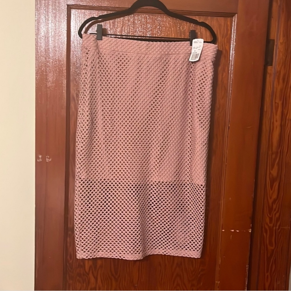 Knee length dusty pink skirt